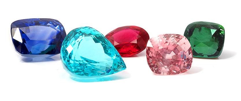 Assorted coloured gemstones of various shapes and sizes
