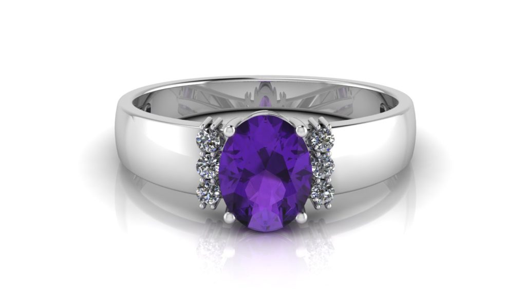 White gold ring featuring an oval cut amethyst and diamond accents