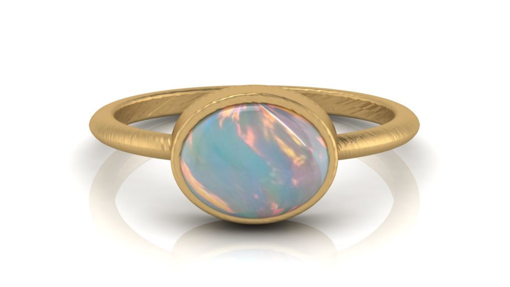 Yellow gold textured bezel set opal ring