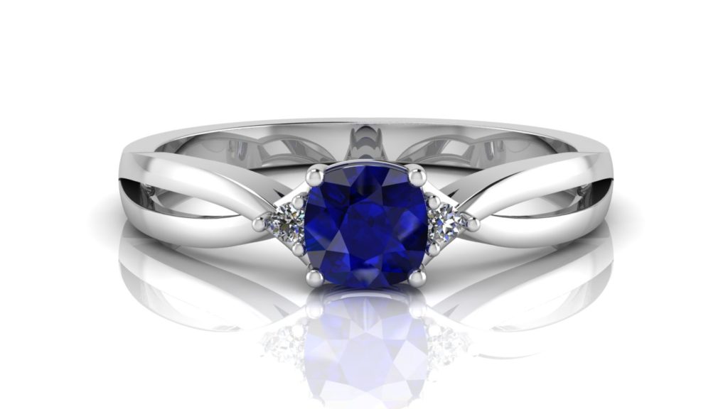 White gold sapphire ring with diamond accents
