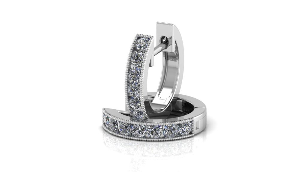 White gold channel set lever back hoops with diamonds and milgrain accents