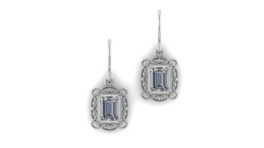 White gold vintage style earrings featuring emeral cut diamonds with milgrain accents