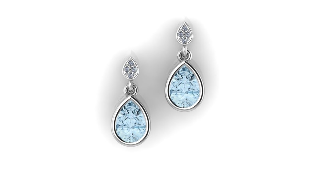 White gold studs featuring a bezel set blue topaz and accent diamonds