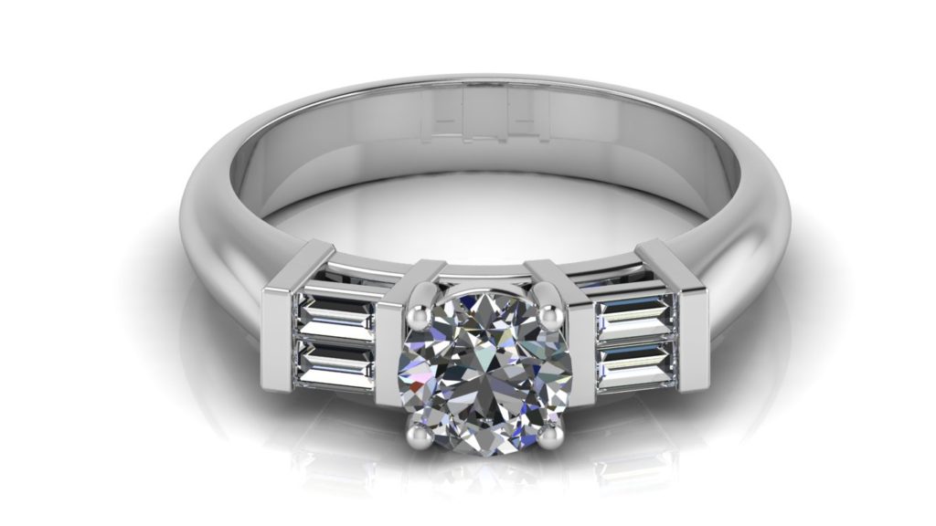 White gold engagement ring featuring a round diamond with side baguettes