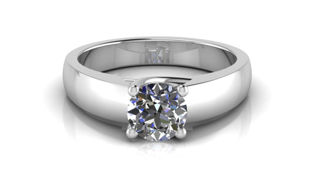 White gold solitaire engagement ring featuring a round diamond
