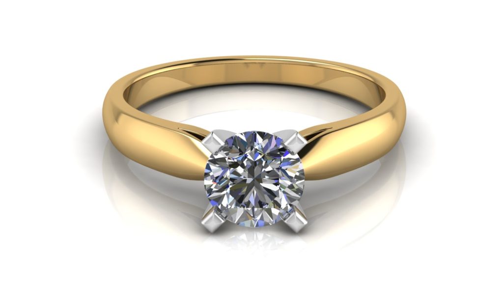Yellow gold solitaire engagement ring featuring a round diamond set in a white gold setting