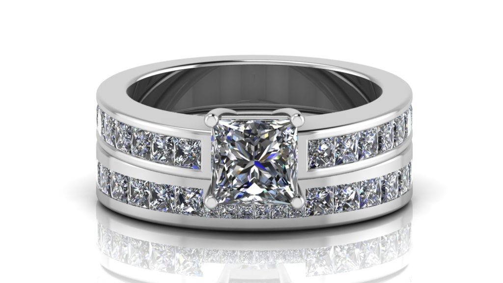White gold engagement and wedding band featuring a claw set princess cut diamond and smaller channel set princess cuts