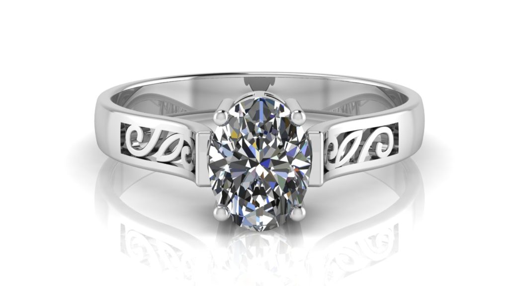 White gold engagement ring featuring an oval cut diamond with scroll work accents