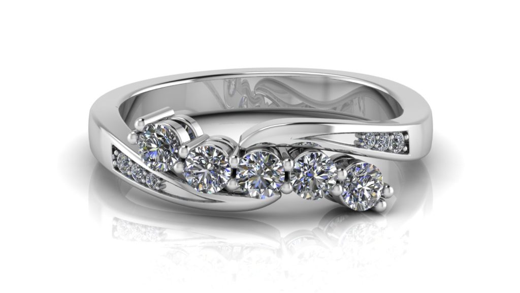 White gold bypass engagement ring featuring five round diamonds and smaller accent diamonds