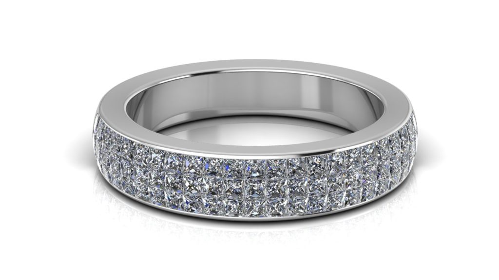 White gold illusion set ring with princess cut diamonds