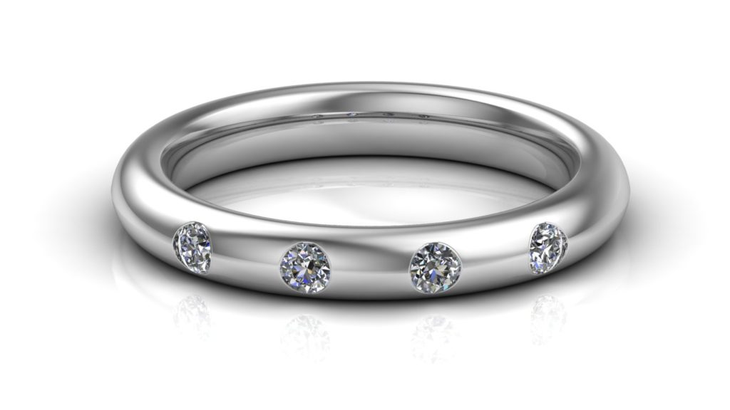 White gold ladies band featuring four flush set diamonds