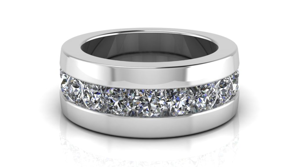 White gold wide ladies band featuring channel set diamonds