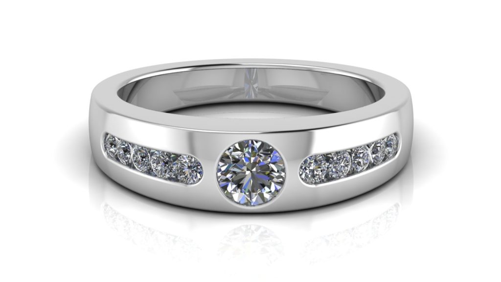 White gold ladies band featuring a flush set round diamond with channel set diamond accents