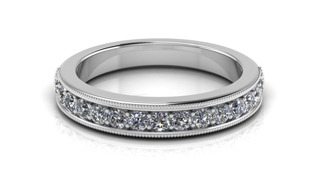 White gold ladies ring featuring pave set diamonds with milgrain accents