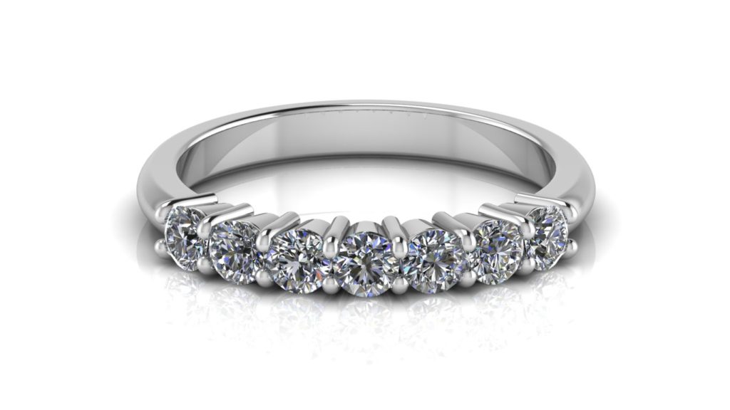 White gold ladies share claw ring featuring seven diamonds